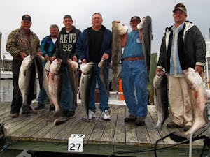 company fishing trip group photo