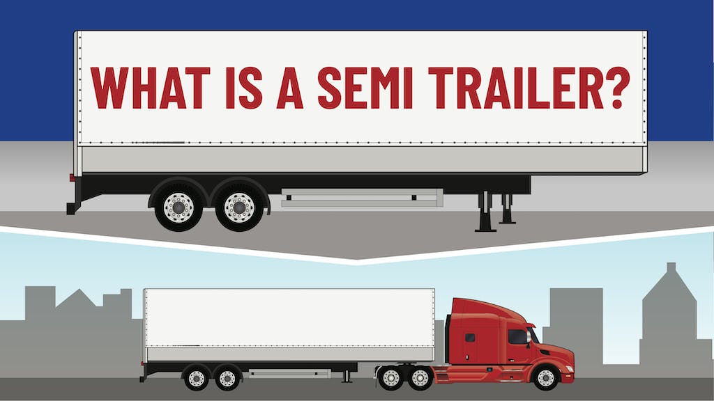 A semi trailer driving on the road. 