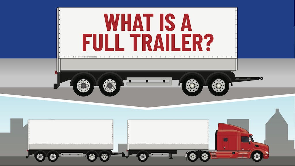 A full trailer driving on the road. 