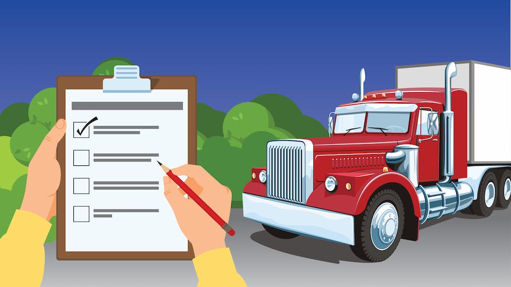 A clipboard with a checklist in front of a semi truck. 